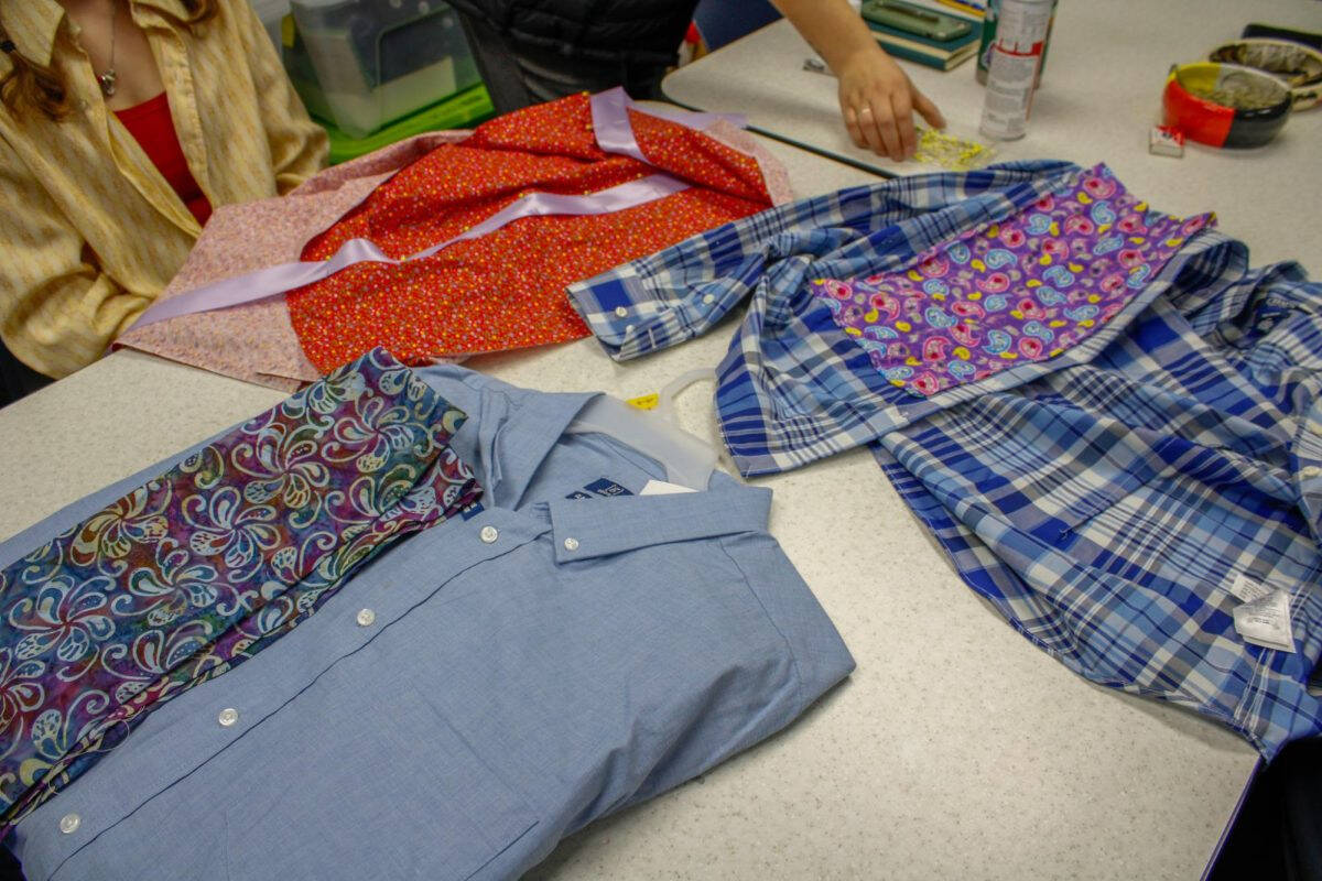 A collection of garments displayed on a table